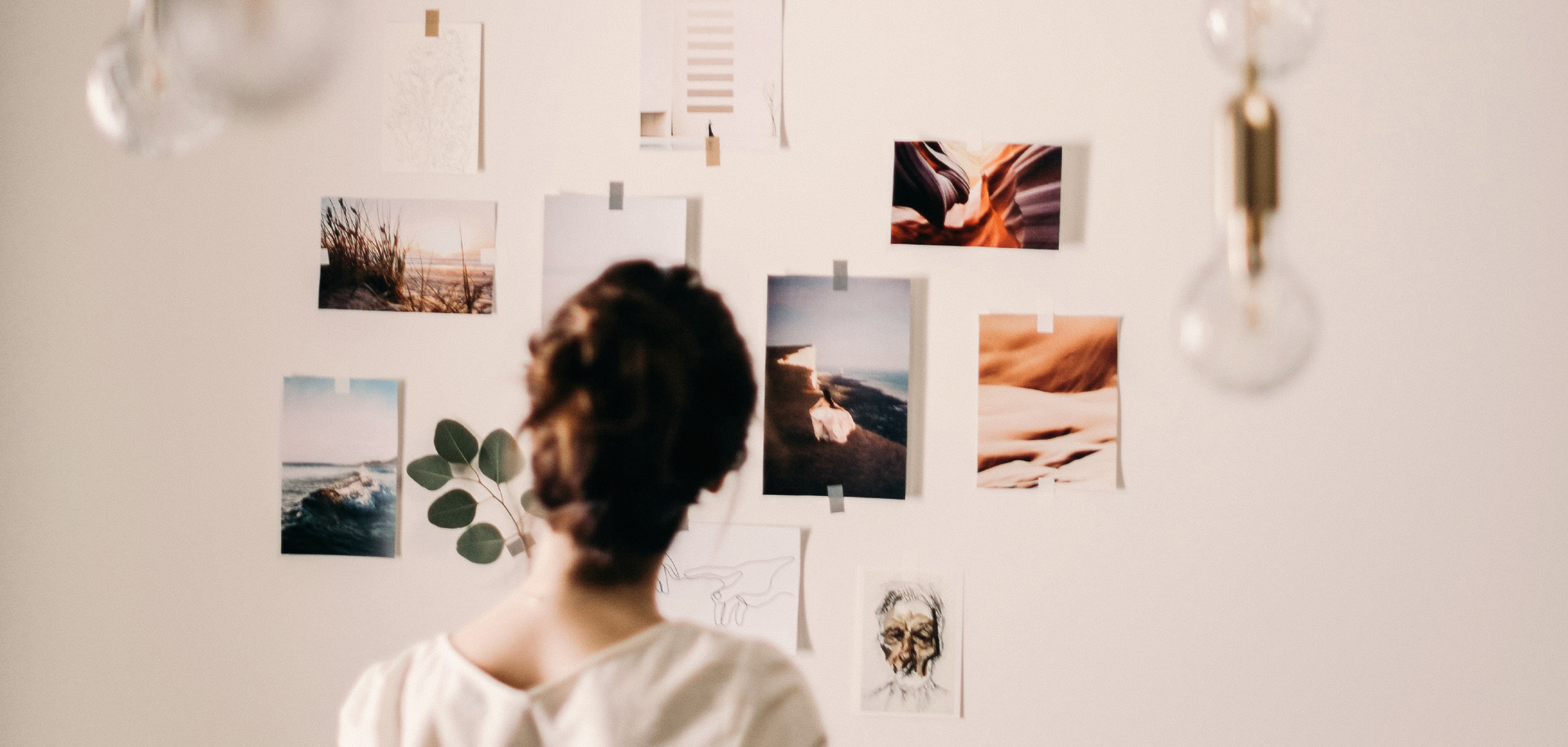 View of Back of Woman's Head looking at vision board